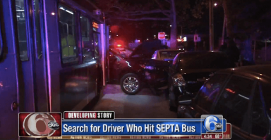 Police look for driver of SUV in bus crash