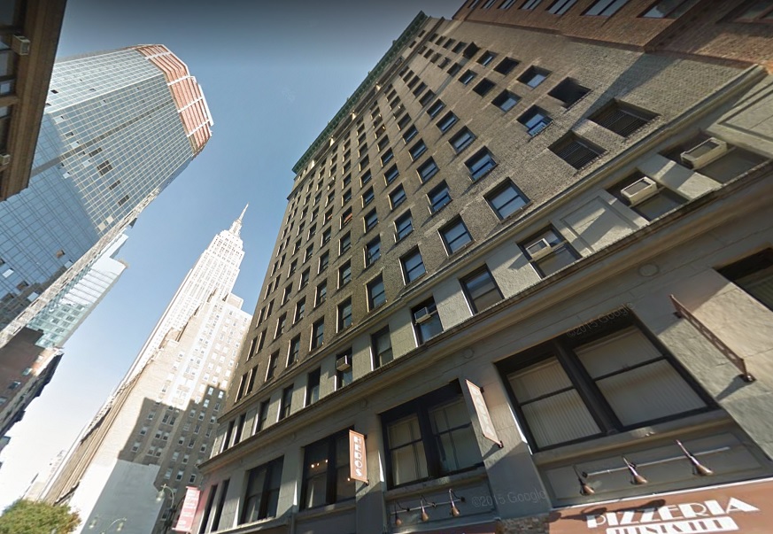 The building by which the bodies of the couple were located after their leap from the ninth floor. (Photo via Google Maps)