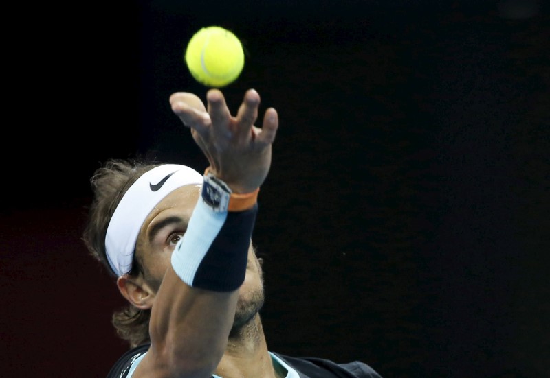 Nadal cruises, net-focused Raonic slugs it out in Brisbane
