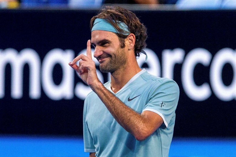 Federer signals intent with rout of Gasquet