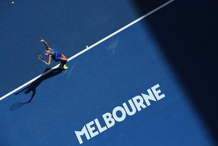 Australian Open blazes but extreme heat avoided
