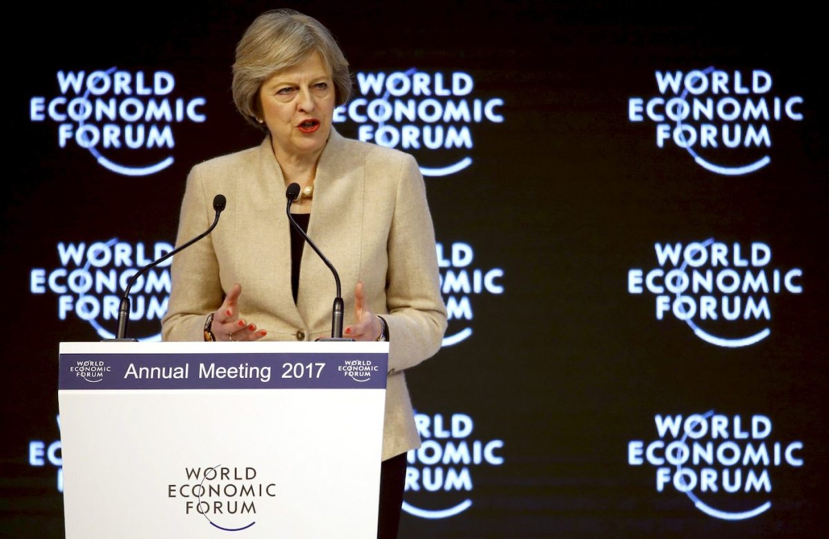 UK PM May urges firms to end short-term thinking, show global leadership