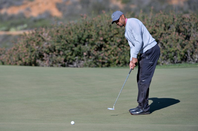 Woods draws comfort from improved form at Torrey Pines