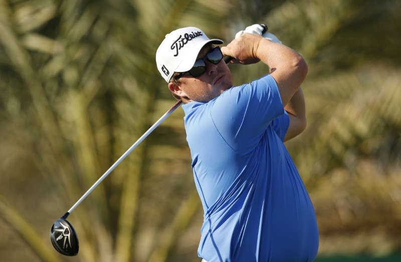 Golf: Coetzee leads as wind disrupts Dubai Desert Classic