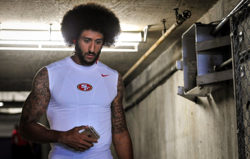 Kaepernick to stand during national anthem: report