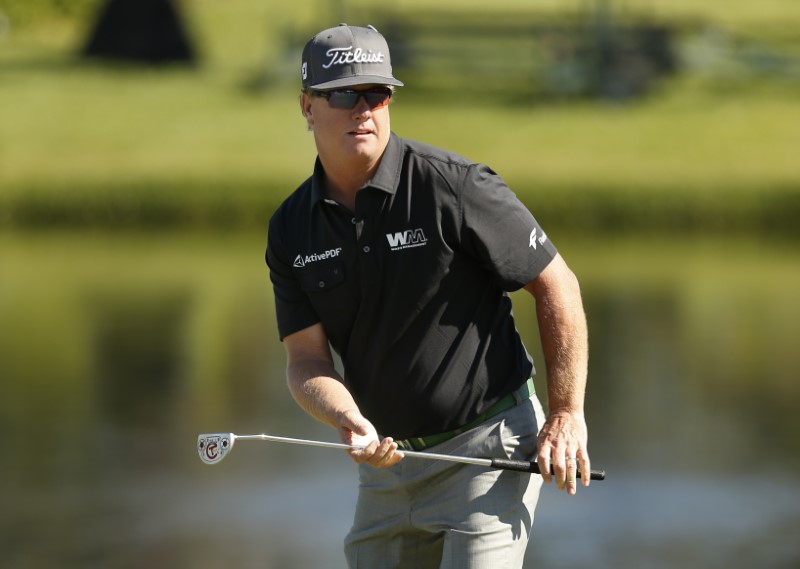 Golf: Hoffman surfs into Bay Hill lead as Day gets a lucky break