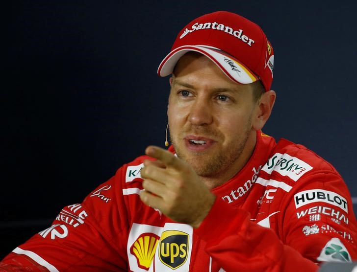 Fired up’ Ferrari in the hunt, says Vettel