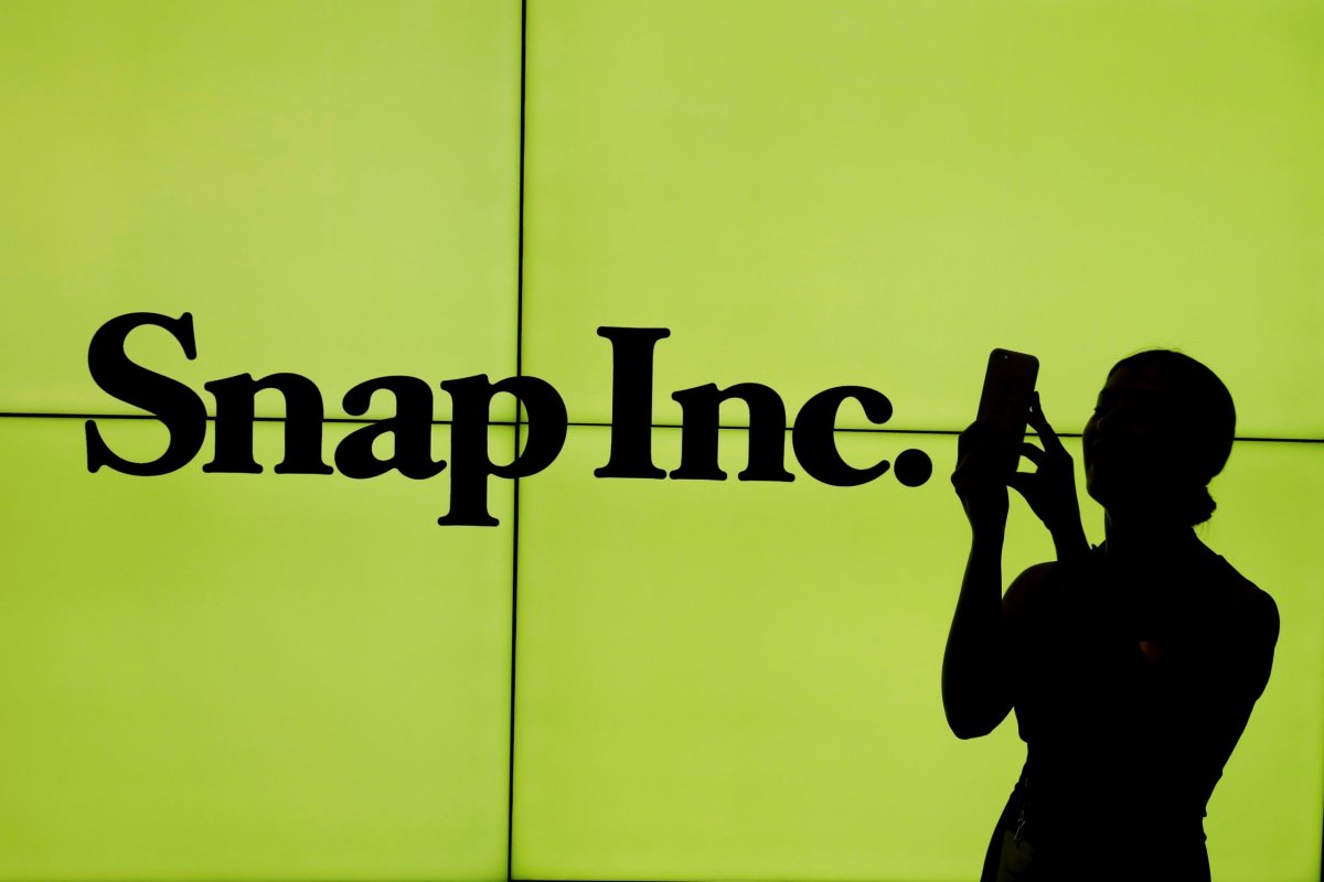 Snap ends down slightly in brisk trade on lockup expiry