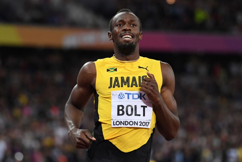Sore Bolt to run in 4×100 meters qualifying