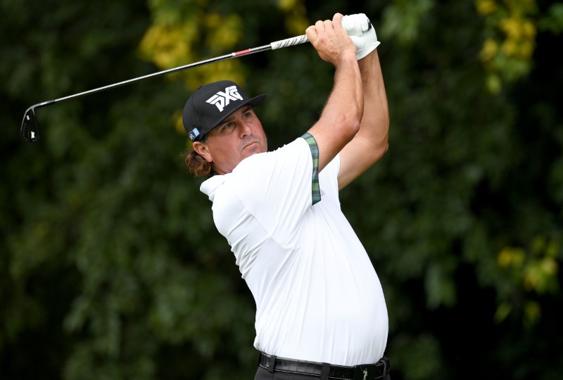 Golf: Hot-putting Perez tightens grip in Malaysia