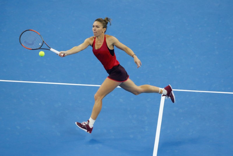 Top-ranked Halep hoping to keep dream alive at WTA Finals