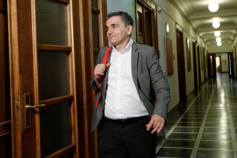 Greece, lenders reach deal on reforms under bailout review