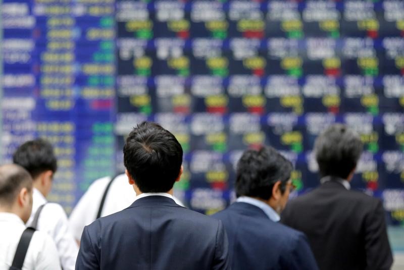 Asia stocks flirt with historic highs on global growth cheer