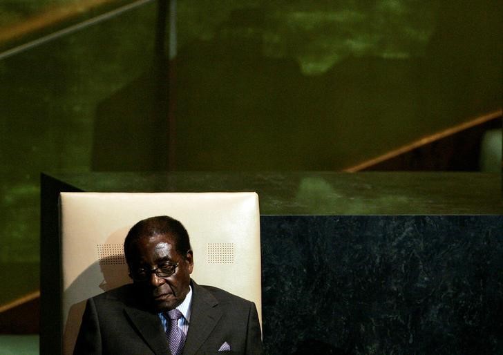 Former Zimbabwe ministers loyal to Mugabe charged with corruption