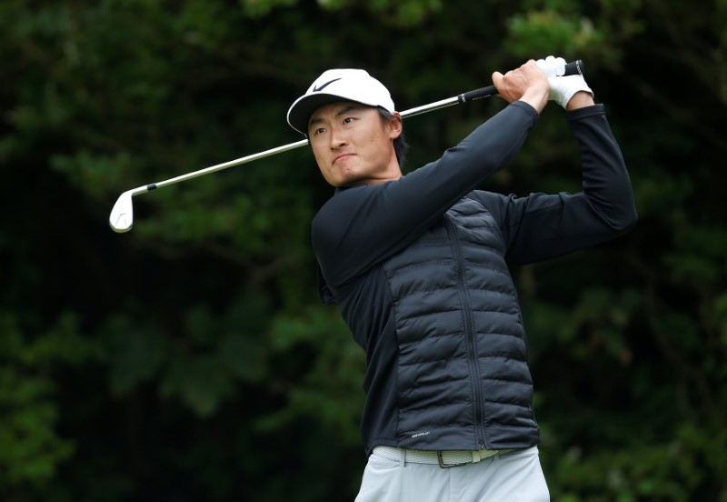 Golf: Last-gasp Li birdie helps Asia take lead against Europe