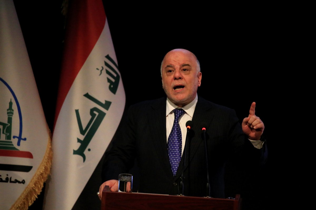 Iraqi PM Abadi to seek re-election, in alliance with Iran-backed group