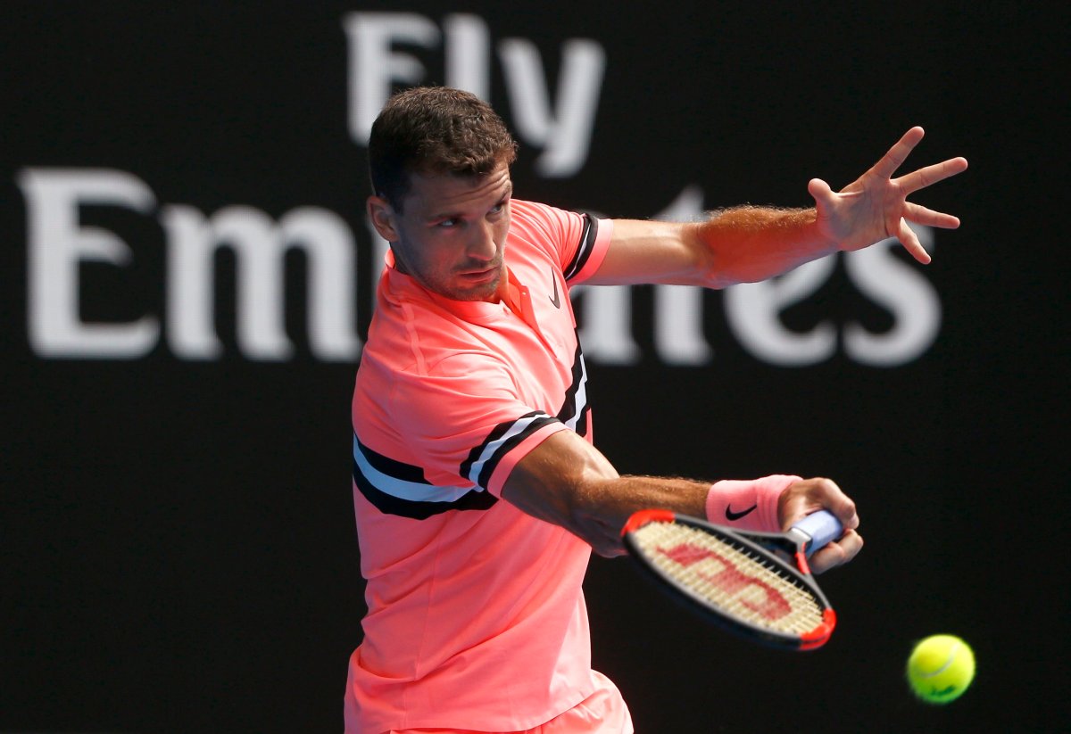 Tennis-Dimitrov schools Novak to reach second round at a canter