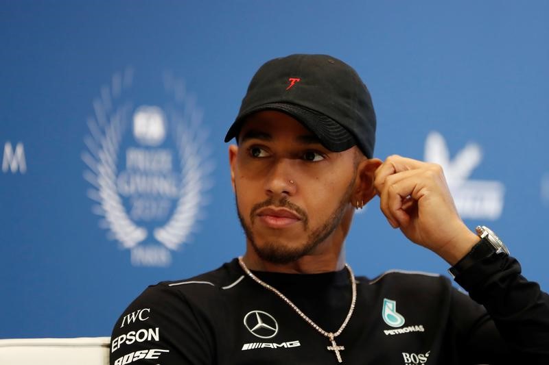 Motor racing: Hamilton misses sponsor event but back on social media