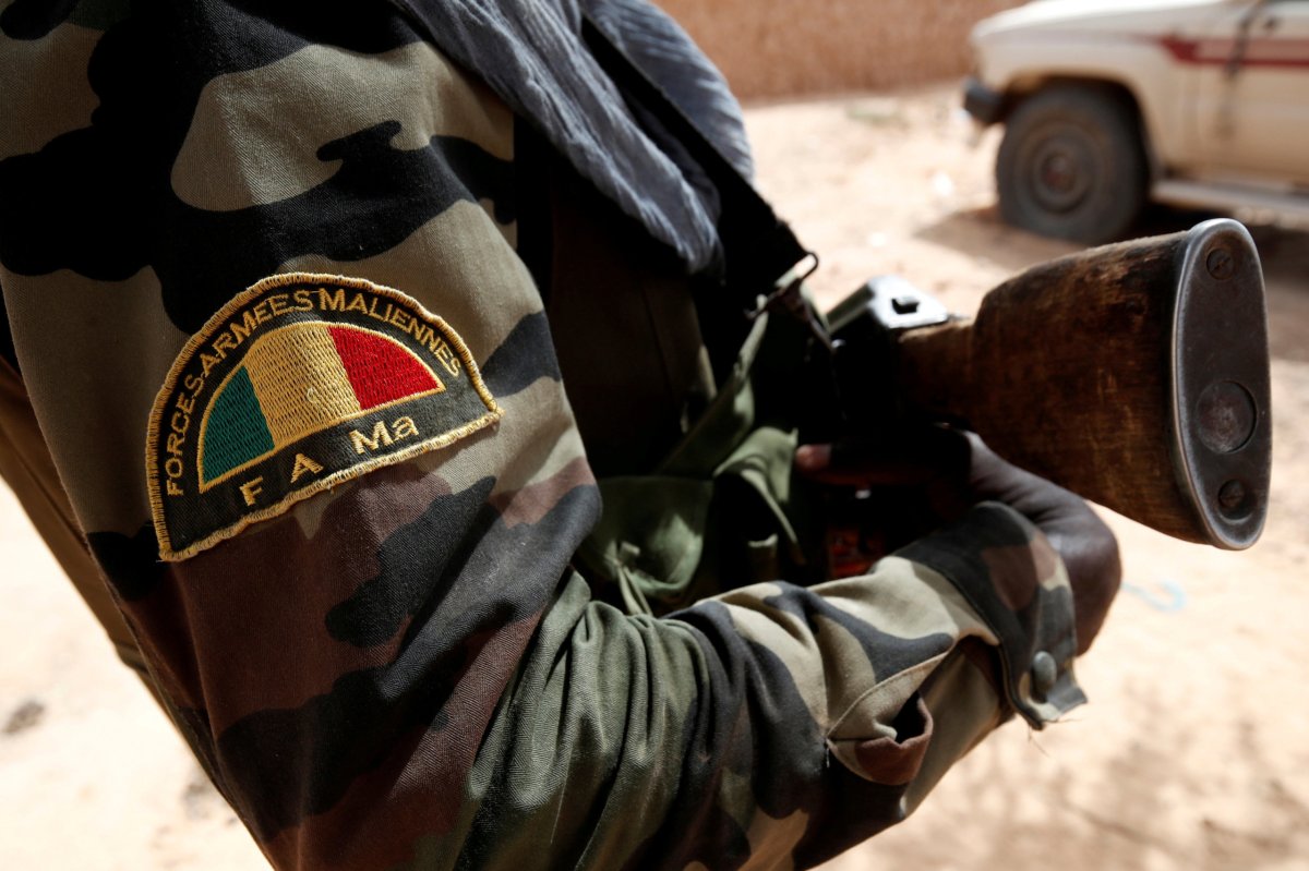Gunmen kill at least 14 Mali soldiers in attack on army camp