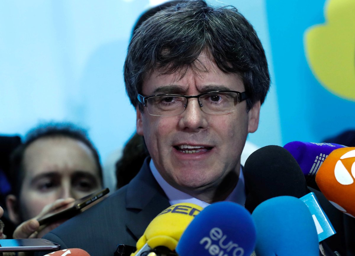 Spanish court says Puigdemont must attend parliament in person