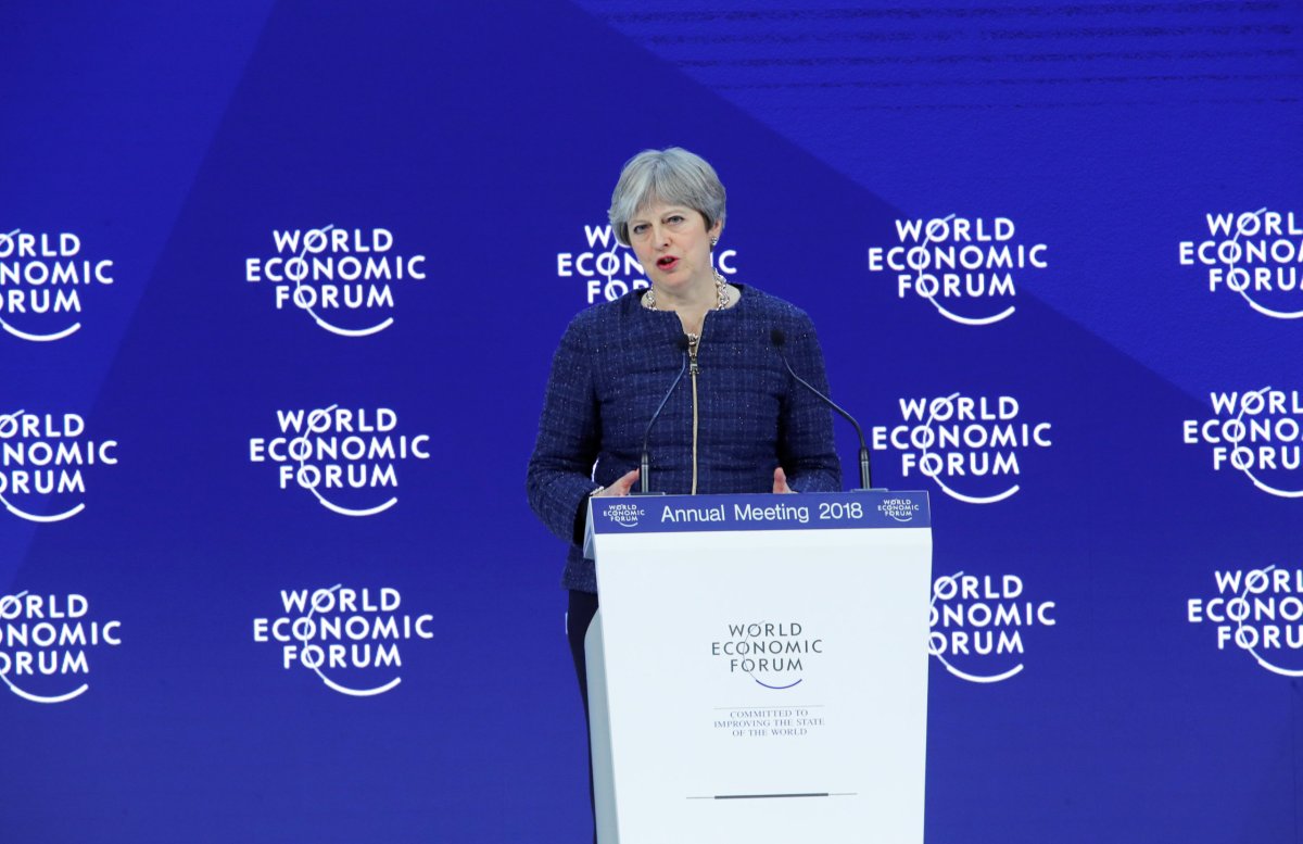 UK’s May promises frank discussions with China amid dash for trade