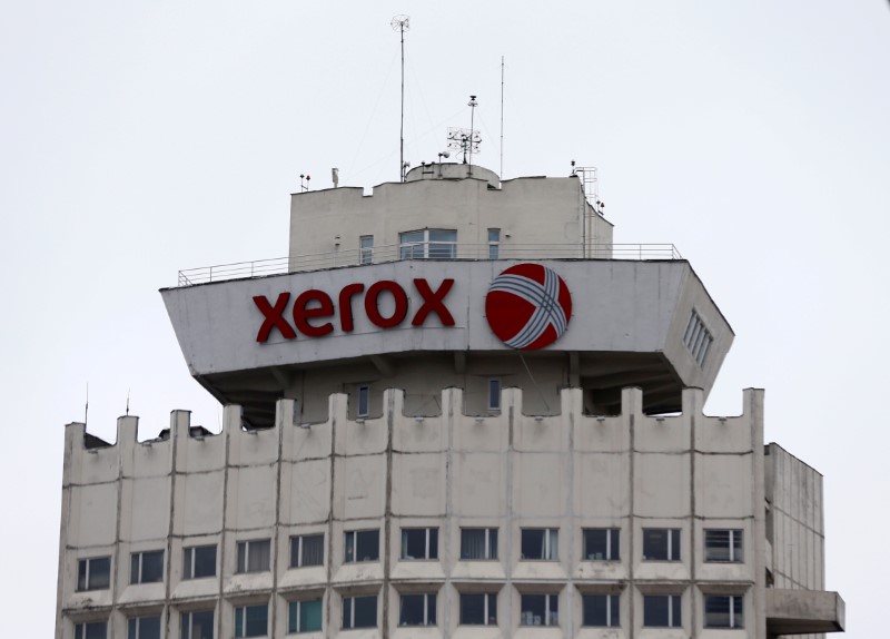 Xerox reports fourth-quarter loss