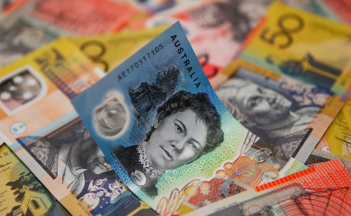 Australian, NZ dollar seen defying volatility in the year ahead: Reuters poll