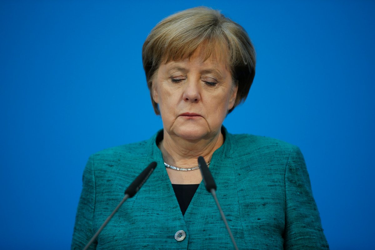 Merkel dodges question on Poland’s new Holocaust law