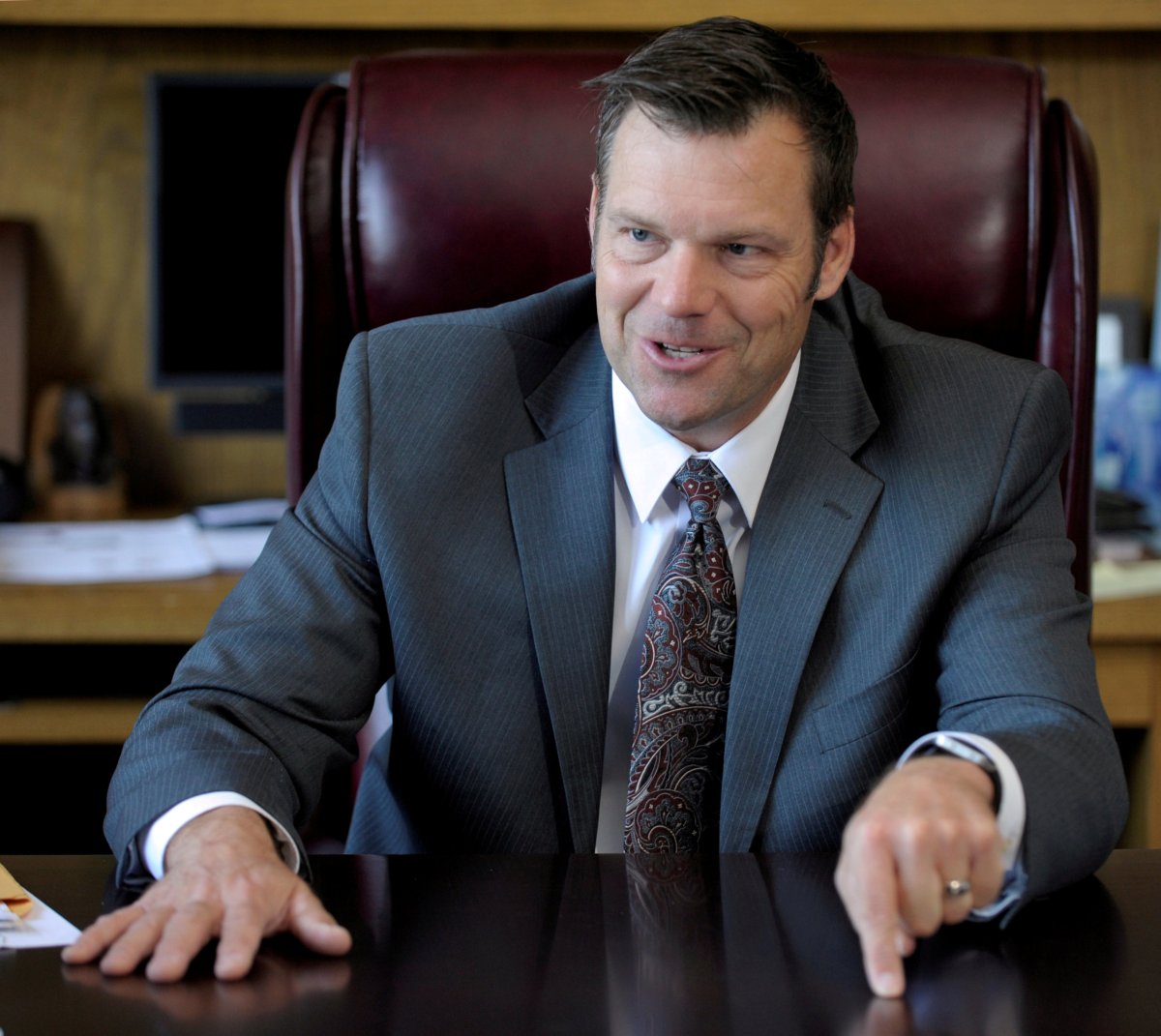 Judge says no decision for at least a month in Kansas voter ID case