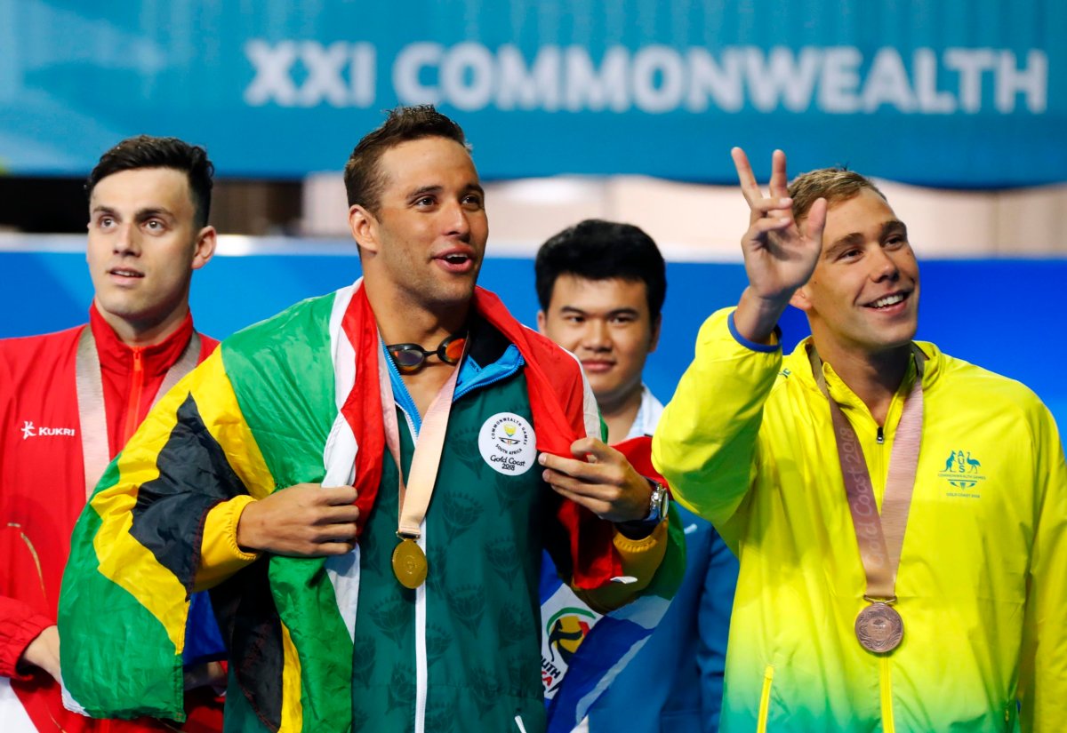 Three-up Le Clos, Van der Burgh lead South Africa as upsets dominate
