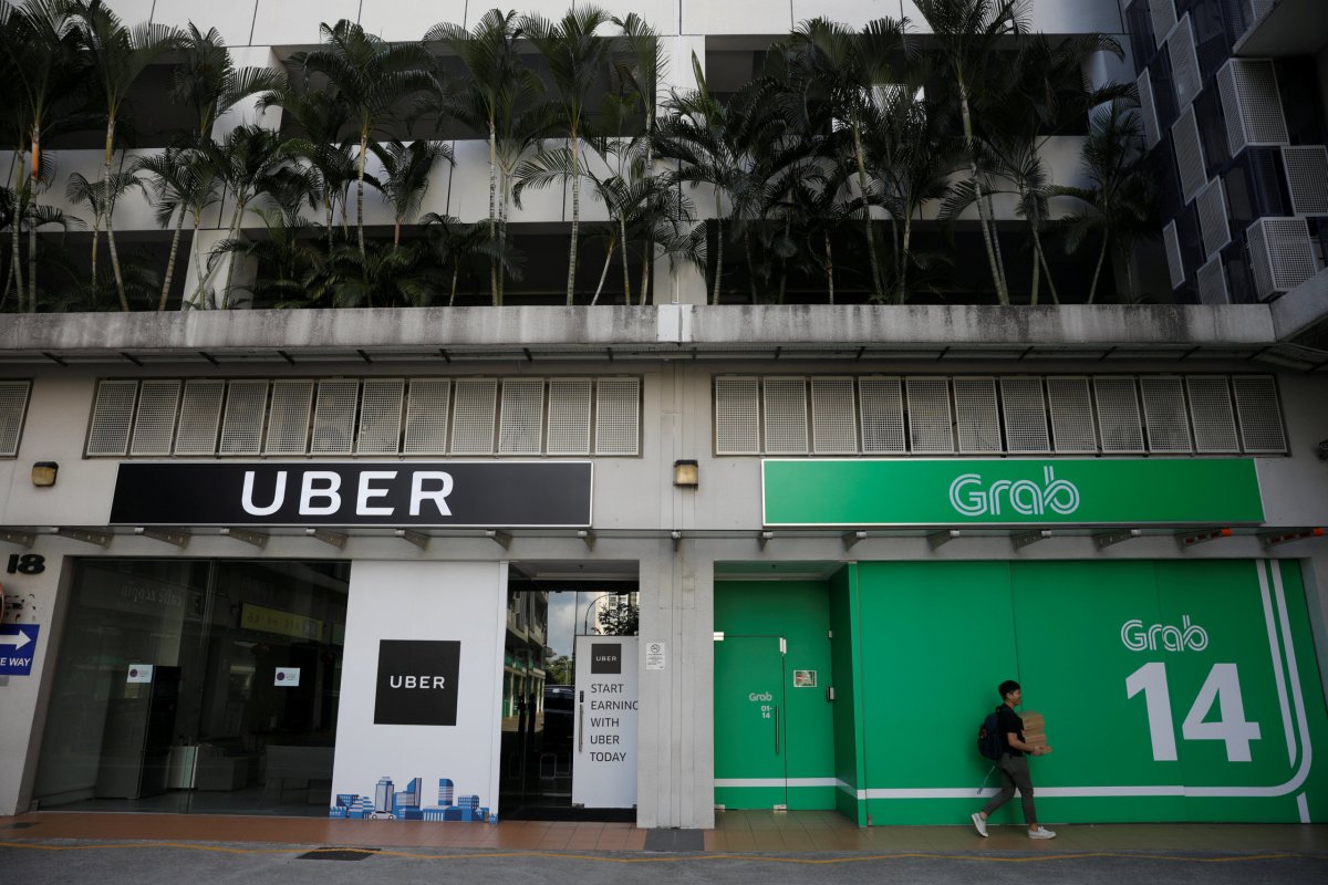 Singapore watchdog sets interim measures for Uber-Grab deal