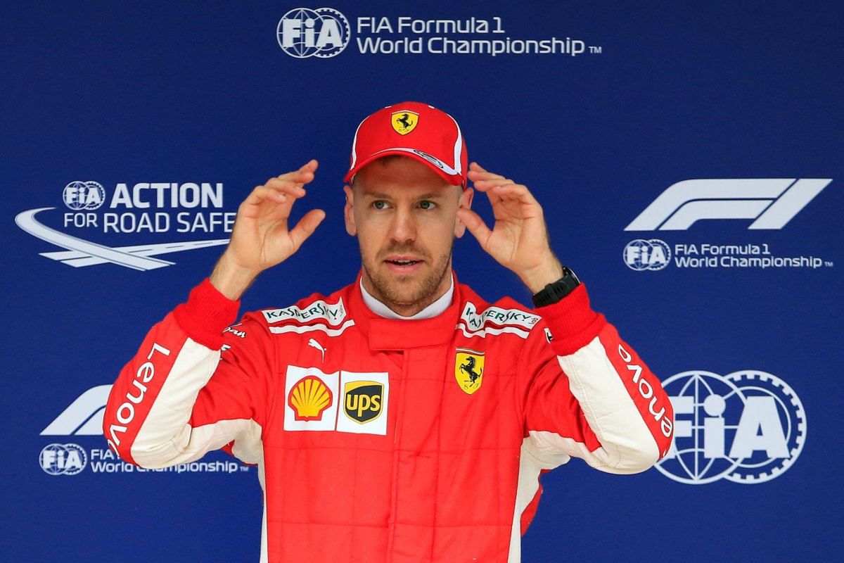 Motor racing: Ferrari stun rivals with qualifying speed