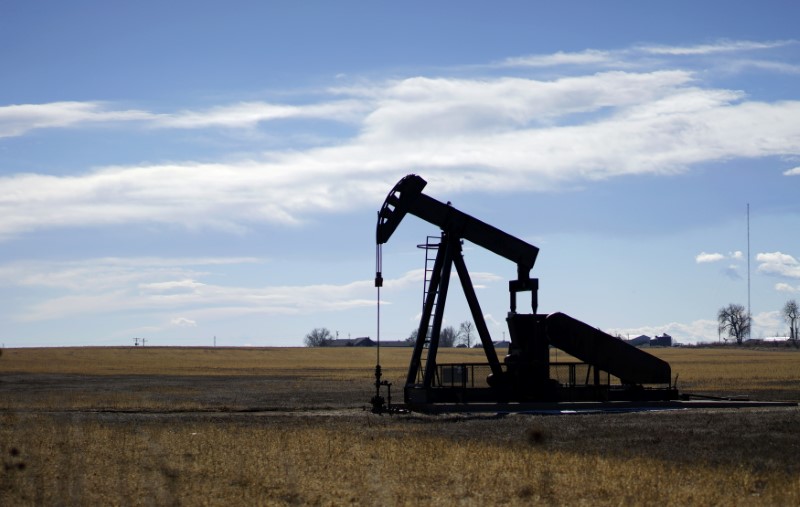 Oil close to late-2014 highs on supply cuts, strong demand