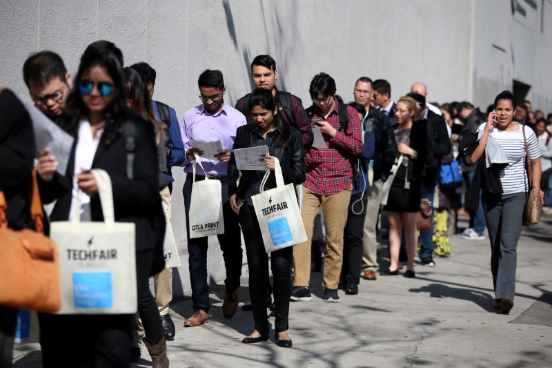 U.S. jobless claims rise slightly, labor market firming