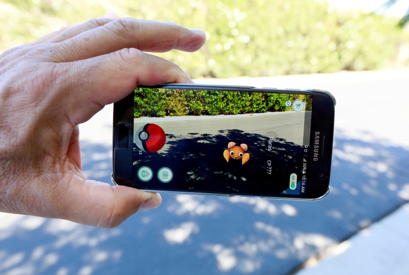 Pokemon Go blamed for crimes but also aids embattled U.S. police