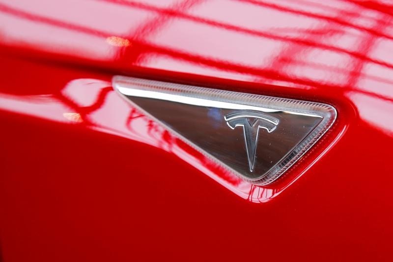 Tesla shortens web address, mum on formal name change