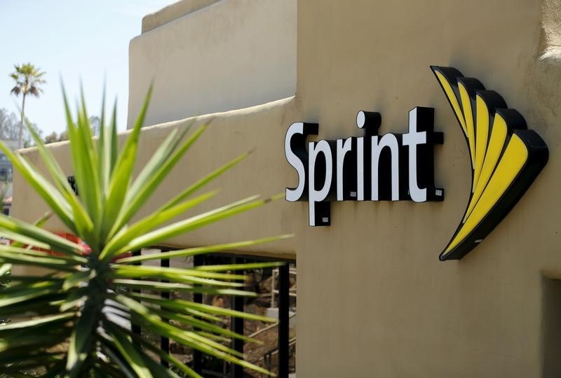 Sprint says to be cash-flow positive next year, shares soar