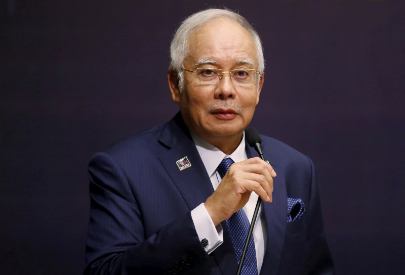 Malaysia’s Najib gets new powers amid planned protests over fund scandal