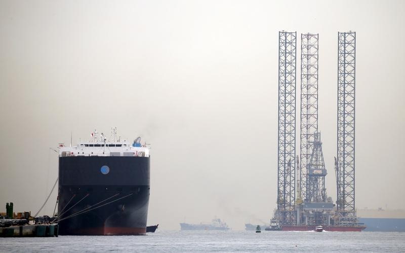 Oil down 3 percent after surprise U.S. crude, gasoline builds