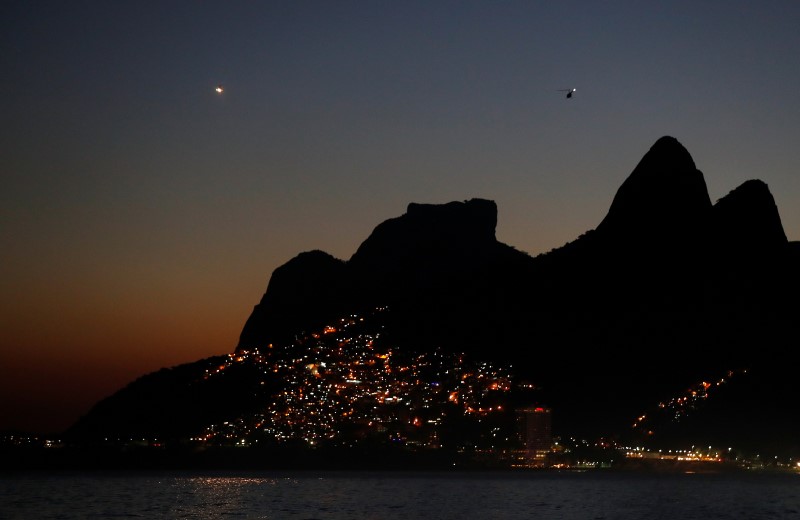 Ahead of Olympics, Brazilians map neglected favelas to boost business