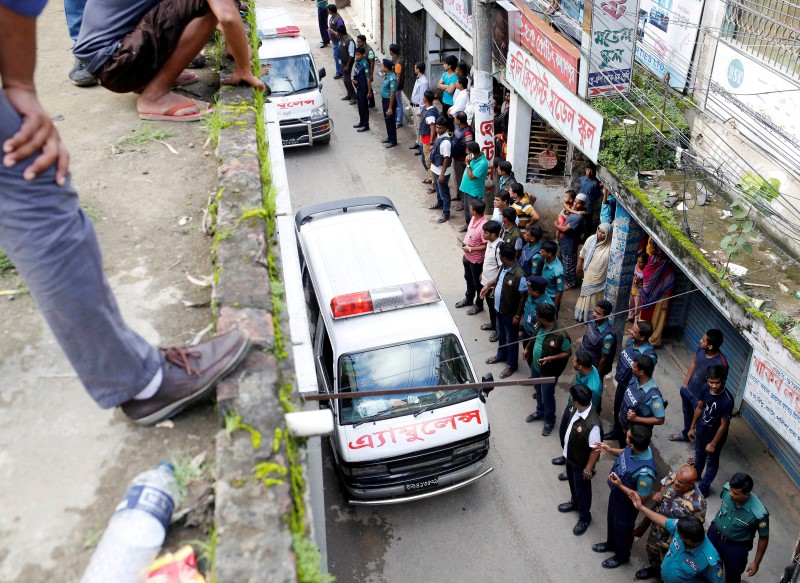 Dead Bangladesh-American suspect was friend of cafe attacker: police