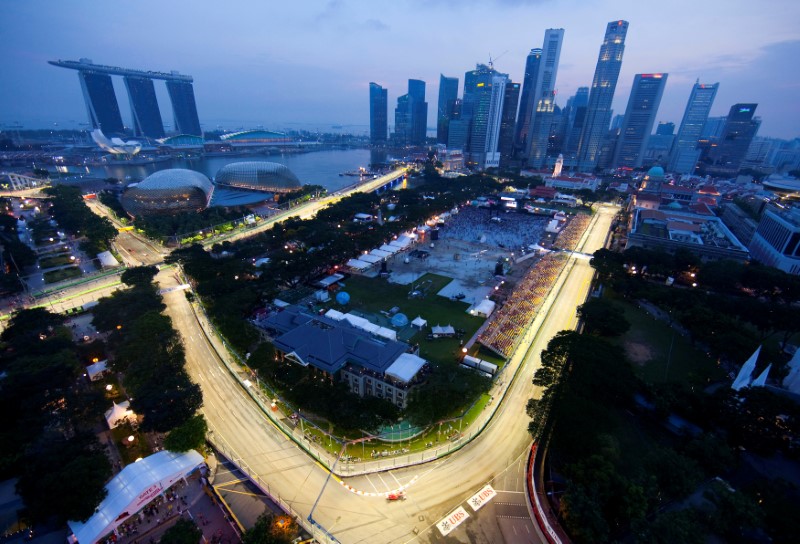 Motor racing-No deal yet but F1 plans long-term stay in Singapore: Carey