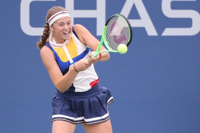 Ostapenko finds busy schedule to her liking after Wuhan win