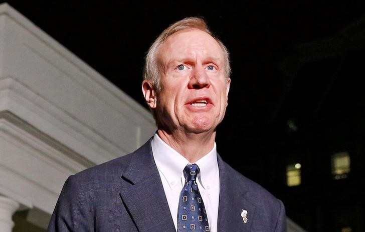 Illinois governor takes aim at pensions, healthcare costs in budget