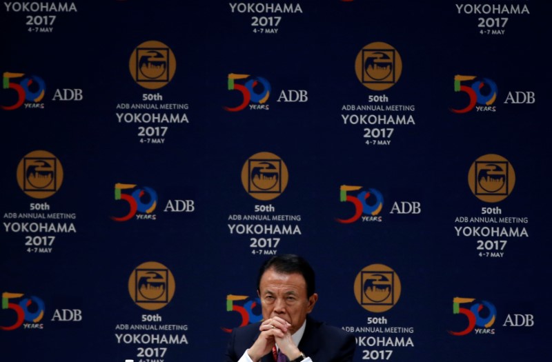 Japan finance minister: government not guiding forex policy with specific