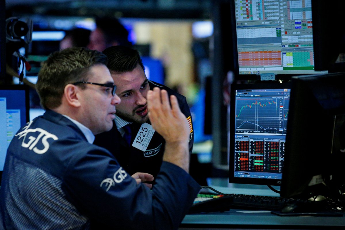 Nasdaq rises, Dow dragged down by tariff worries