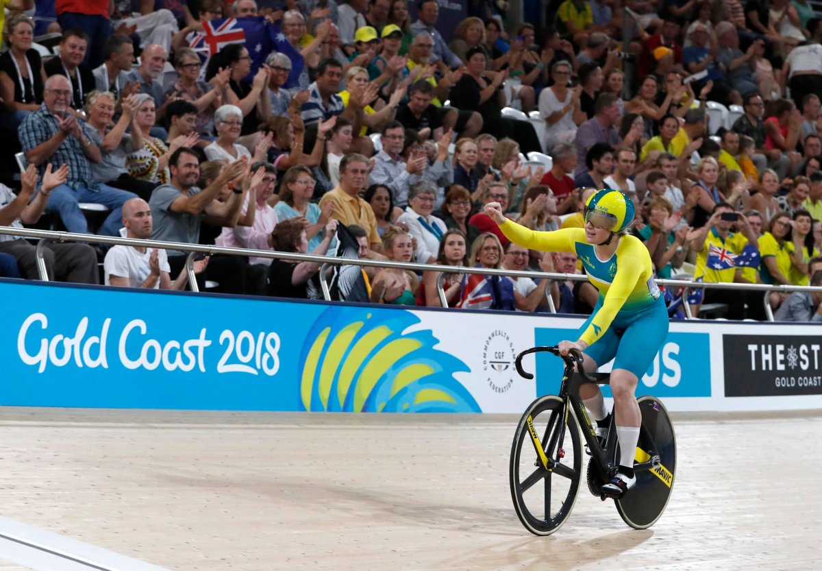 Games: Australian Morton defends sprint gold at mentor’s velodrome