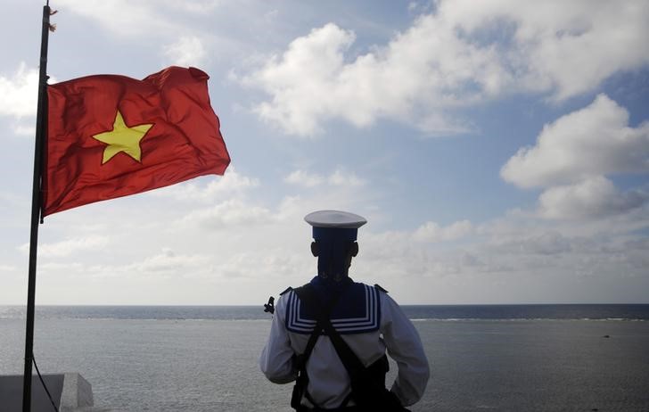 Vietnam says Chinese bombers in disputed South China Sea increase tensions