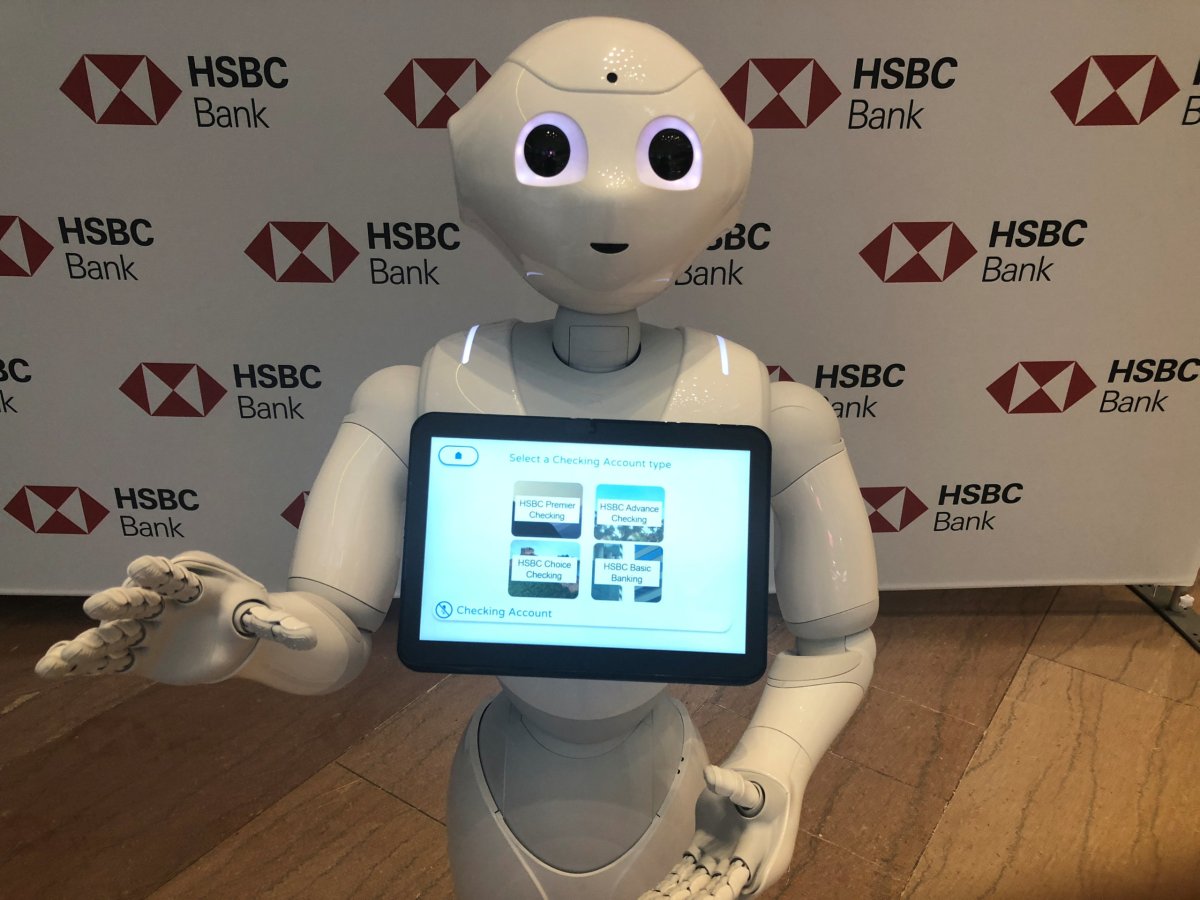 Banks turn to espressos, dancing robots to help keep U.S. branches alive