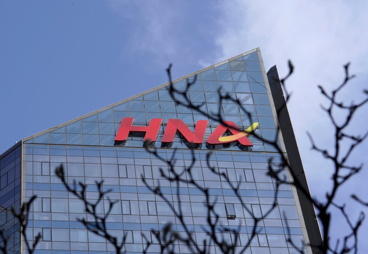 Exclusive: HNA in talks with bad debt firm Cinda as it extends $43 billion